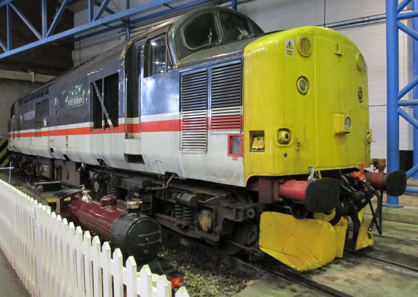Class 37 Class 37/5 37518 FORT WILLIAM (37 518, ex 37076, D6776) built in 1962 by English Electric, Robert Stephenson & Hawthorns Ltd. Seen here in Intercity Swallow livery at York NRM.