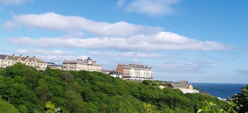 The splendid profile of houses on the cliff above Saltburn beach, including in the middle, the ex Zetland Hotel (see below)