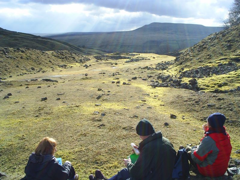 The scarred lead mining area and walking on tracks used by miners.