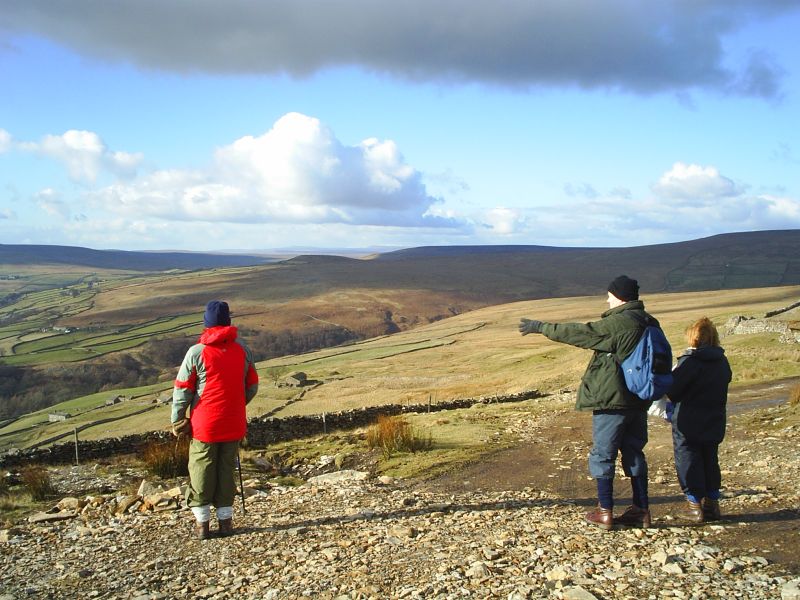 The scarred lead mining area and walking on tracks used by miners.
