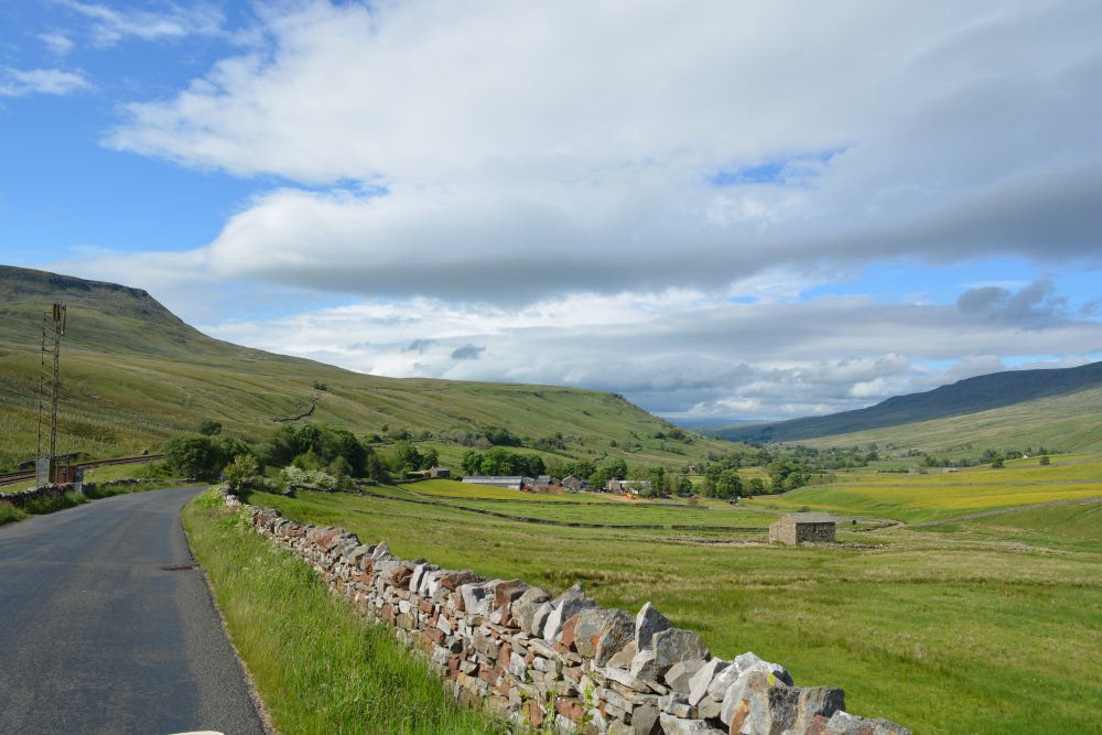 Looking down the B6259 towards Aisgill and Mallerstang Dale from near Cotegill Bridge over the Settle-Carlisle railway line Aisgill walking on Mallerstang Common, Cumbria, England
