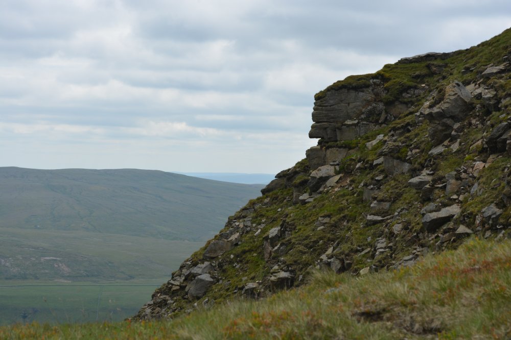 A fine profile of the rocky Nab  Climbing up Wild Boar Fell, walk from Mallerstang Dale, Cumbria, England
