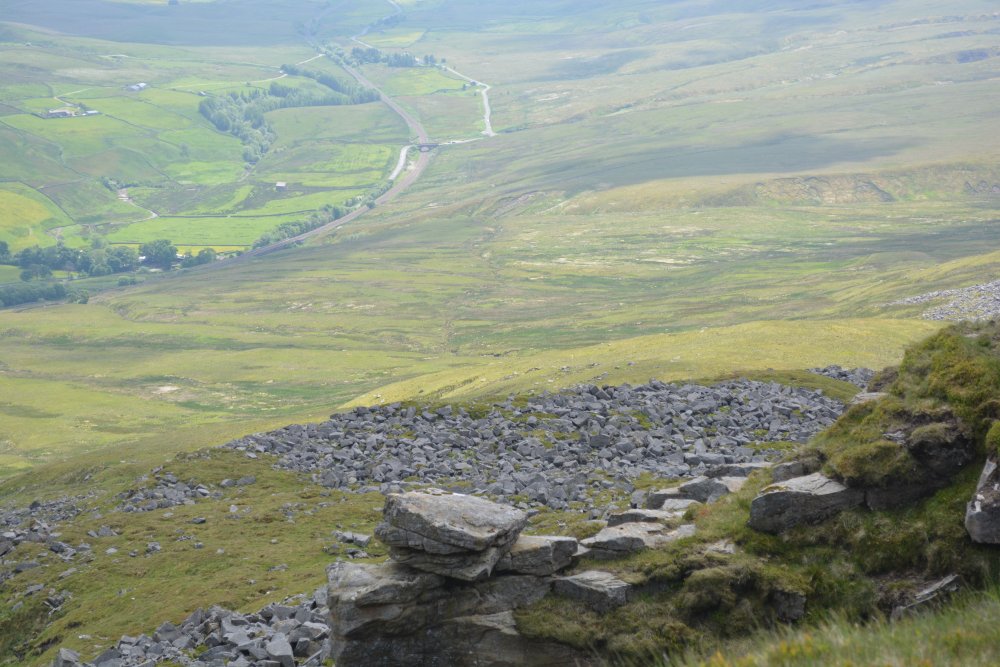 View down to Aisgill Climbing up Wild Boar Fell, walk from Mallerstang Dale, Cumbria, England