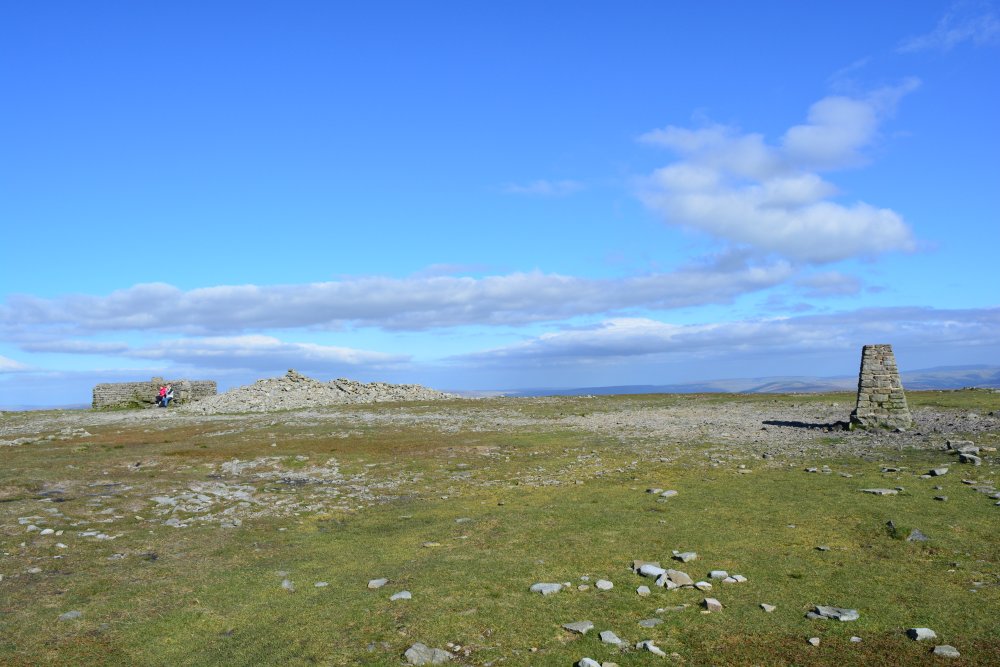 shelter, cairn and trig point on the summit of Ingleborough