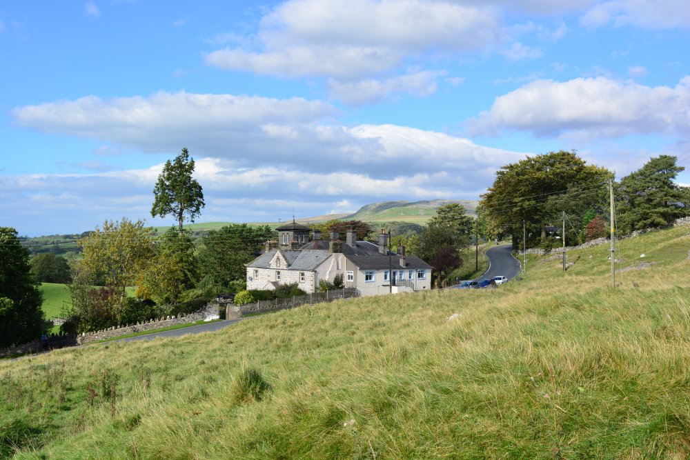B6265 road start ofwalk large white house near Storrs Common Climbing Ingleborough walk