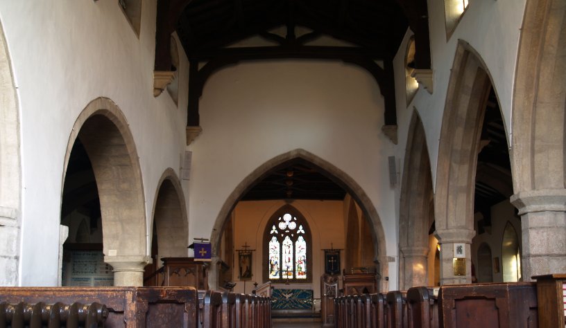 interior of of the Church of St Michael and All Angels, Linton, view down the nave to the altar and east window walk from Grassington, Wharfedale, North Yorkshire Dales National Park, England