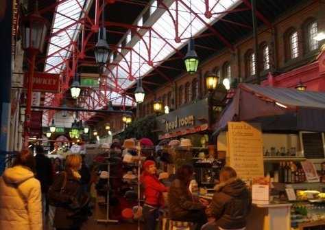 Inside St George's Arcade market for trinkets, music and food.