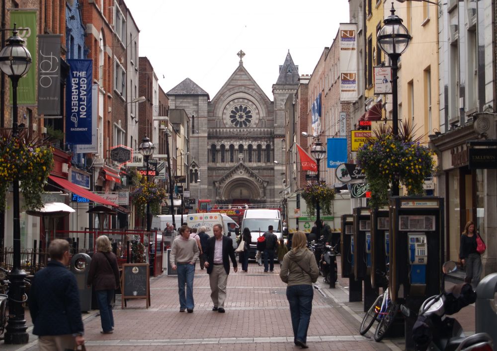 Looking down Anne Street South off Grafton Street to the facade of St Anne's Church, Dublin, is seen at the end Dublin, Ireland