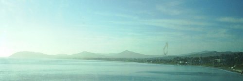The hills and mountains of Wicklow from the DART near Bray.