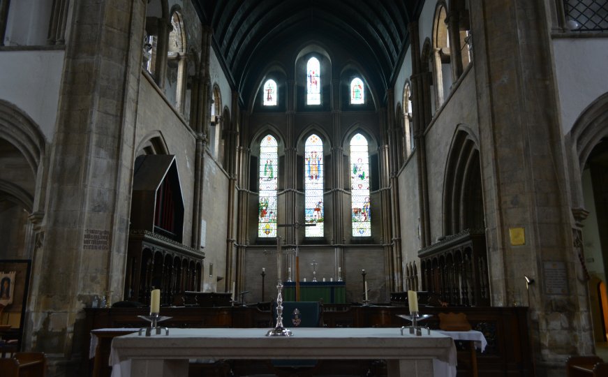 The east stained glass window above the altar and chancel of Grimsby Minster