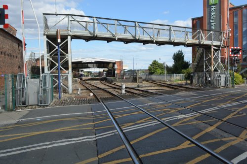 The footbridge and level crossing adjacent to Grimsby Town railway station