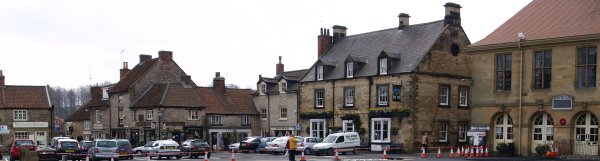 Shops and the Town Hall in Market Square in Helmsley Town.
