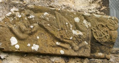 Traces of early medieval carving by the south entrance.