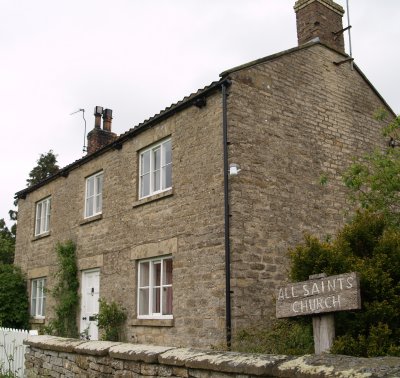 Eventaually working your way across the fields you reach the lovely quiet village of Old Byland, where a simple sign by the 'old vicarage'? indicates the way to All Saint's Church, Old Byland.