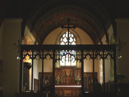 The chancel-choir stalls viewed from the nave with the east window above the alter (see below)
