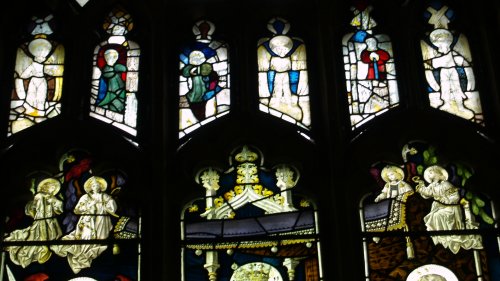 The top traceries of the north facing stained glass windows contains sections of the original medieval glass, whose simplicity contrasts with the more elaborate Victorian stained glass below.