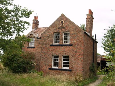 red brick cottage dated 1896 near Angram Hall Farm
