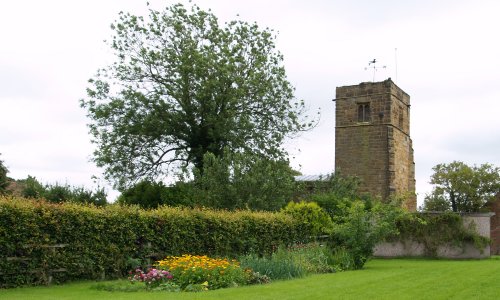 you come into the Husthwaite Village by the Norman church of St Nicholas