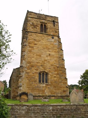 The sturdy buttressed tower was rebuilt in the 15th century.