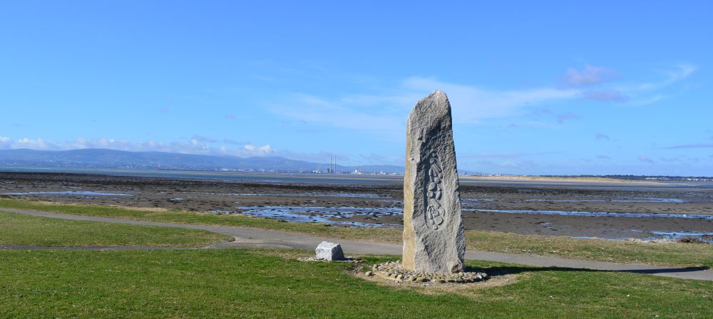 beautiful Lu�-na-Gr�ine (Path of the Sun) Winter Solstice Sunset marking stone, designed by the sculptress Cl�odhna Cussen located on Sutton Creek Greenfield Road Sutton Cross overlooking North Bull island Nature Reserve Howth to Sutton Cliff Walk, Co. Dublin, Ireland