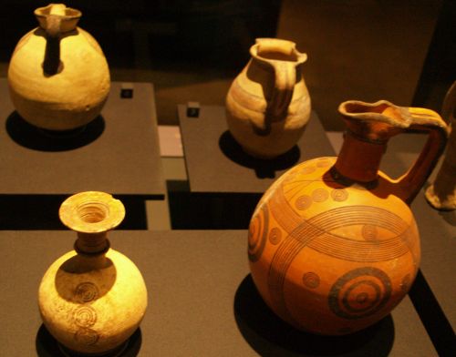 Pottery from ancient Cyprus. On the right is jug of black-on-red ware, Cypro-Archaic 750-600 BC. Archaeology of the National Museum of Ireland, Dublin, Ireland
