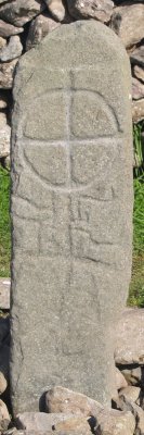 The cross carved on stone near the The Gallarus Oratory - Early Christian sites, Dingle Peninsular, Co. Kerry, West of Ireland