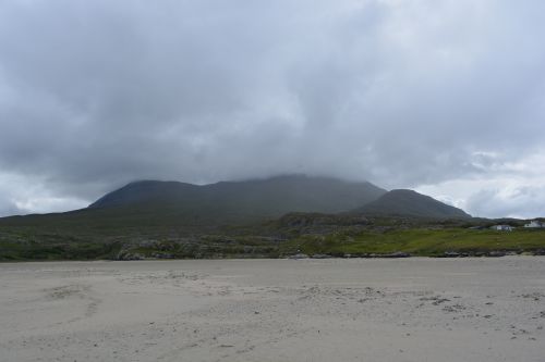 Walking on Silver Strand beach beneath Mweelrea mountain Co. Mayo