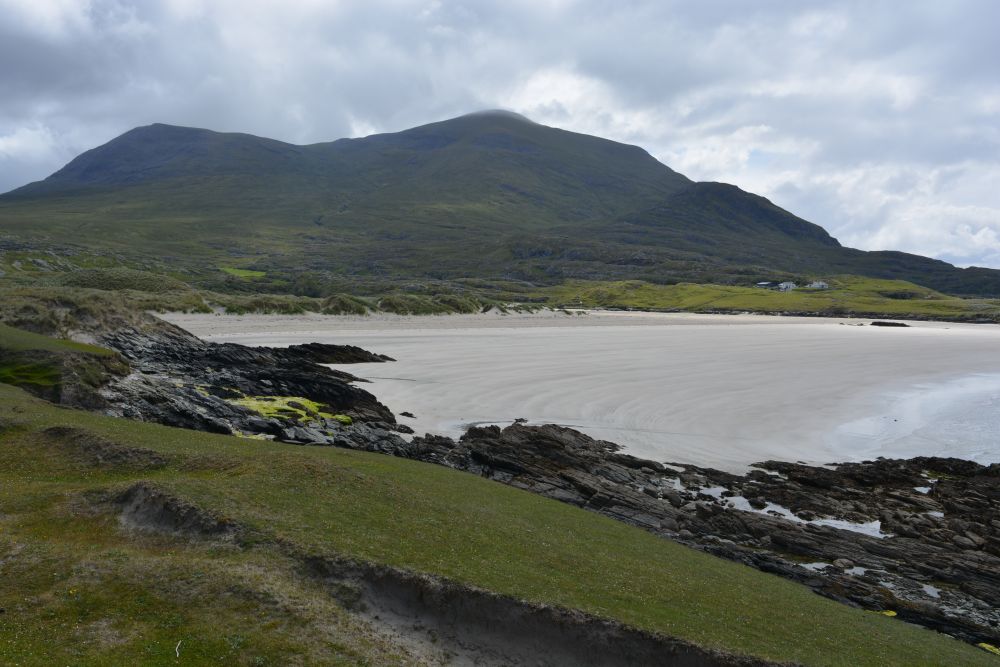 Walking on Silver Strand beach beneath Mweelrea mountain Co. Mayo