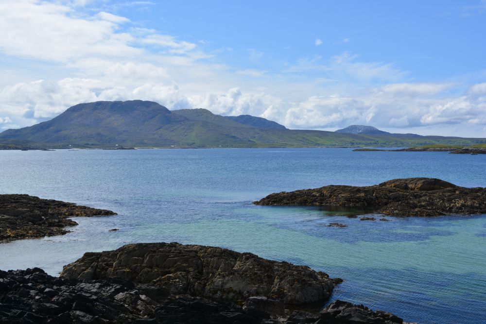 Walking on Silver Strand beach beneath Mweelrea mountain Co. Mayo