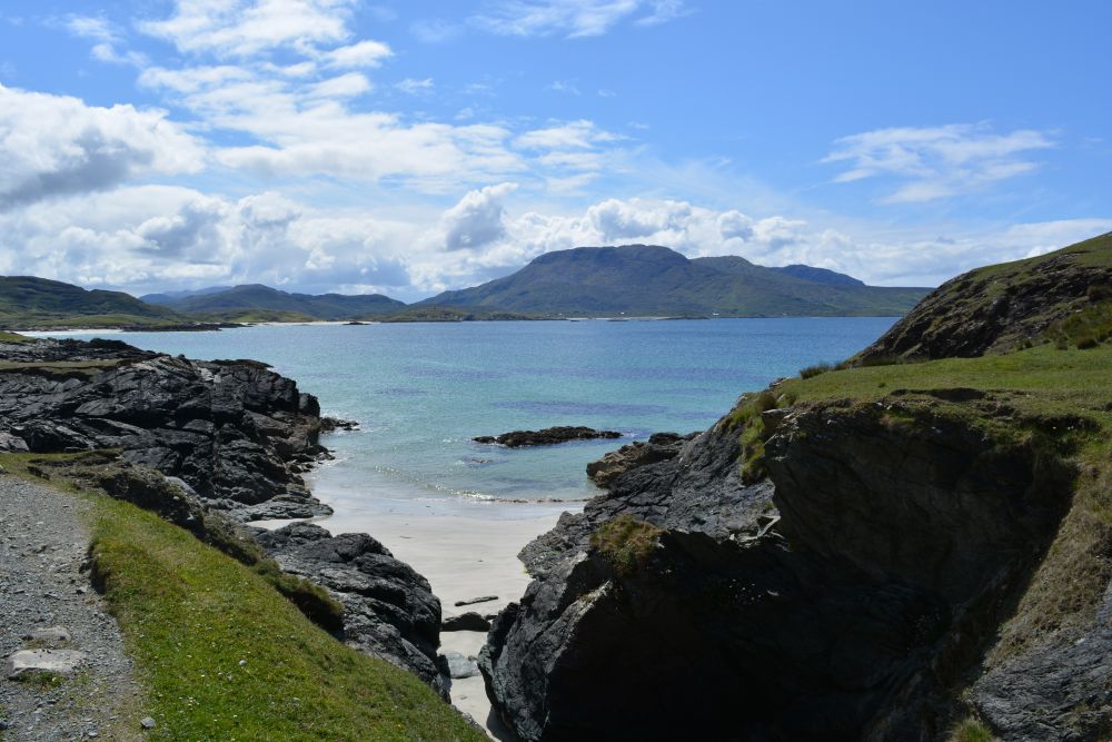 Walking on Silver Strand beach beneath Mweelrea mountain Co. Mayo