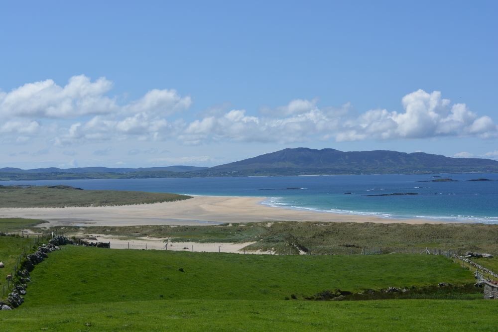 Walking on Silver Strand beach beneath Mweelrea mountain Co. Mayo