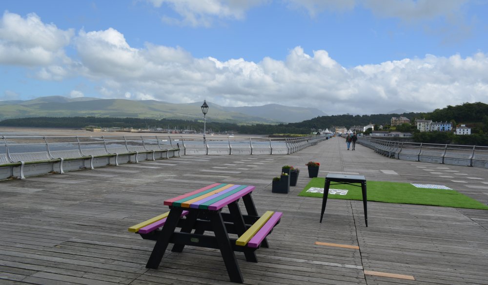 View landwards of the Welsh Hills of North Wales from the cafe of the Bangor Garth Pier, North Wales, UK, Great Britain