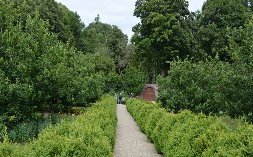 One of many paths you can follow around the borders of plants in the Colclough Walled Garden, Tintern, Co. Wexford 