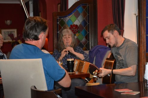 musicians inside Casey's Hotel bar live traditional music in Main Street Glengariff Co. Cork Ireland