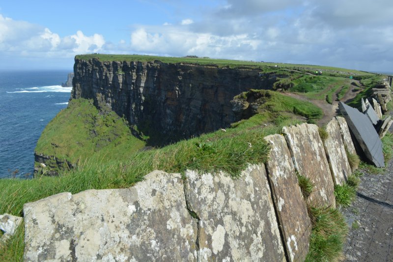 The paved protective walls on the walkway to the fort signal tower Cliffs of Moher, Co. Clare, Wild Atlantic Way, West of Ireland Coast