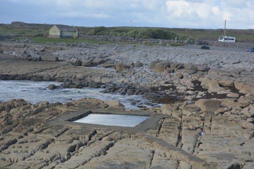 A rectangular swimming pool has been carved out of the rocks near Doolin Pier Co. Clare, Wiild Atlantic Way, West of Ireland