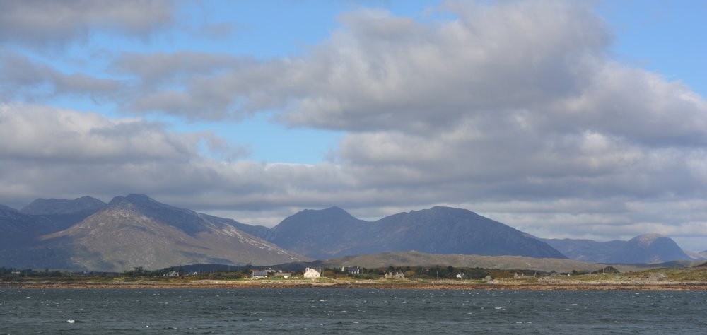 The view of Inishnee (Inis Ni) from Roundstone and beyond the Twelve Bens of Connemara Inish Nii Inish Nee Inishnee Loop Walk, Connemara, Co. Galway, Ireland