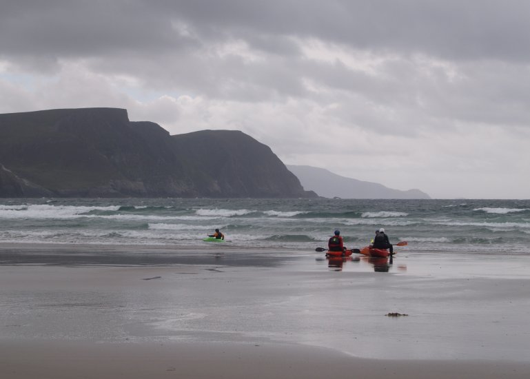 87. Sea canoeing or sea kayaking from Keel Beach, Achill Island, Co. Mayo, Ireland.
