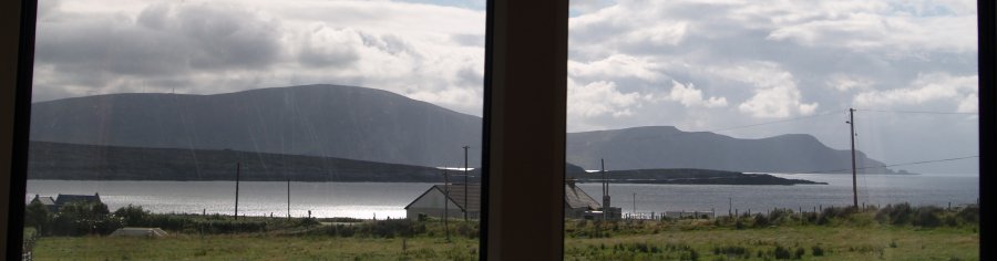 108. Our view of the Minaun Cliffs from our holiday cottage in Dooagh Village, Achill Island, Co. Mayo, Ireland. Note how quickly the weather changes!