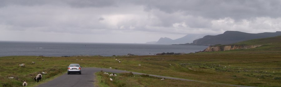 114. Part of the fantastic Atlantic Coastal Drive east of Ashleam Bay, south-east coast Achill Island, Co. Mayo, Ireland. By car, coach trip or on foot, as you have seen in the preceding picture the scenery is outstanding, even on a grey walking day!