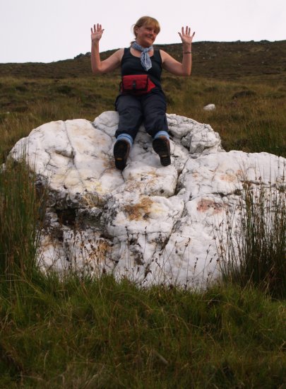 120. A large quartz/quartzite rock (with a leprichorn on it ? aka Molly O'Shea !) and a view across to Croagh Patrick while ascending Slievemore Mountain, Achill Island, Co. Mayo, Ireland. You can also just see the crannog in small lough in the lower right of the right picture!