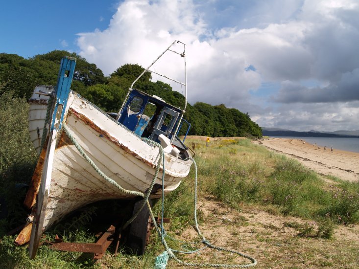 130. An old boat on the grass at Rathmullan Beach, Rathmullan, Fanad Peninsula, Co. Donegal, Ireland.