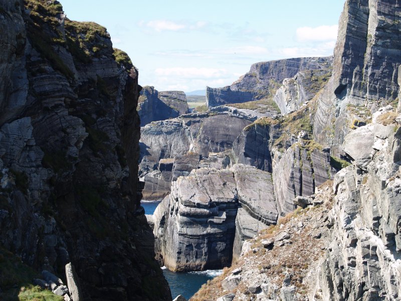 24. The rock formation near the old Mizen Head lighthouse (now a heritage centre), viewing from the linking bridge to the light house, Co. Cork. Scenic Views of Holidays in the South-West of Ireland