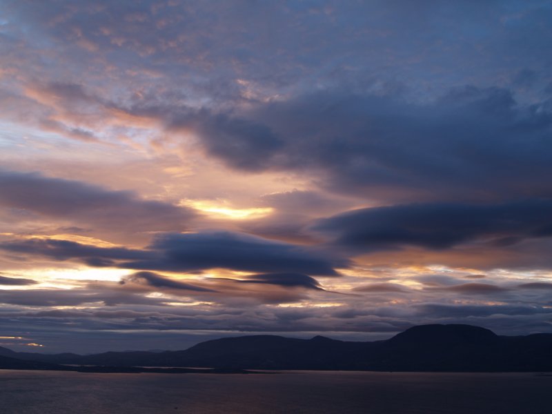 29. Sunset over the Beara Peninsula, Hunger Hill middle right, viewed from Sheeps Head Peninsula Co. Cork. Selected Scenic Views from Holidays in the South-West of Ireland