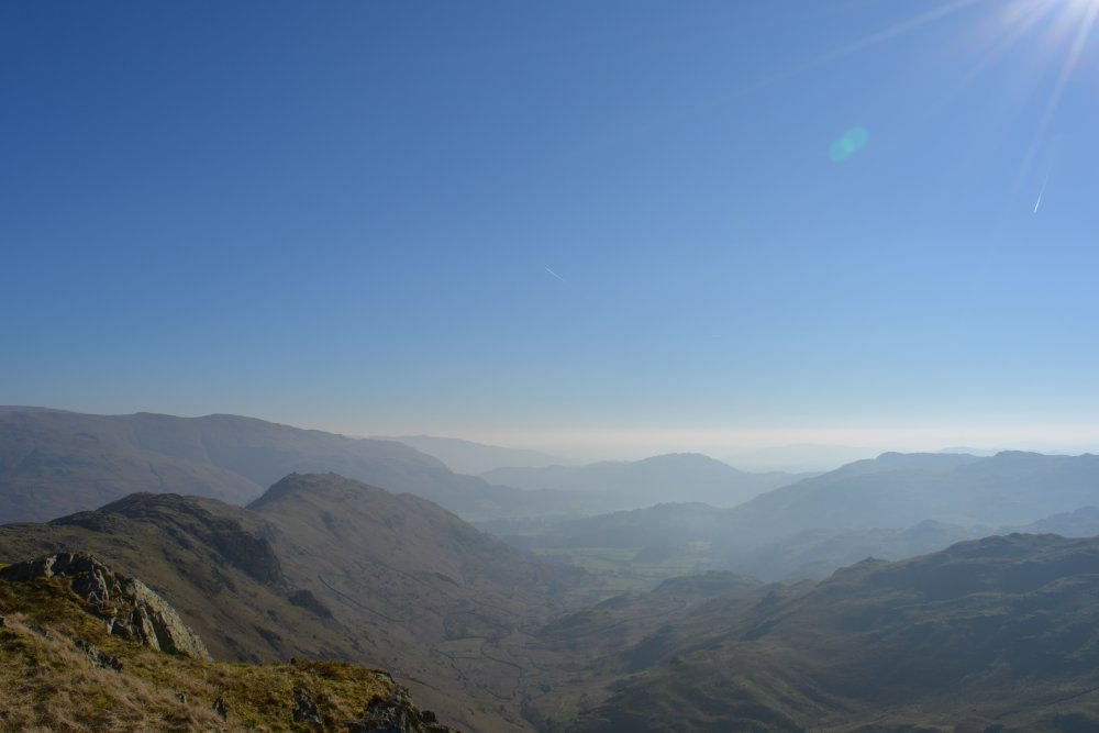 circular walk on hills high above Easedale Tarn, Cumbria, England