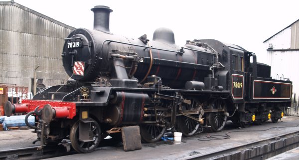 Ex British Railways BR standard class 2MT 2-6-0 78019 (built at Darlington Works in 1954 to a design by Robert Riddles) standing outside the locomotive depot shed at Loughborough Central - The Great Central Railway, England, English Midlands