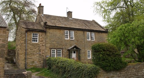 Laburnum Cottage, an attractive house in the main street, part of which is the oldest inhabited house in Eyam.