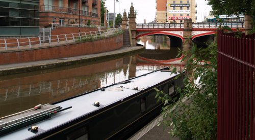 The prettily painted bridge over the Grand Union Canal at Bow Bridge.
