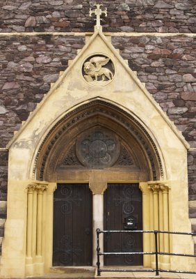 One of the ornately carved doors of St Marks.