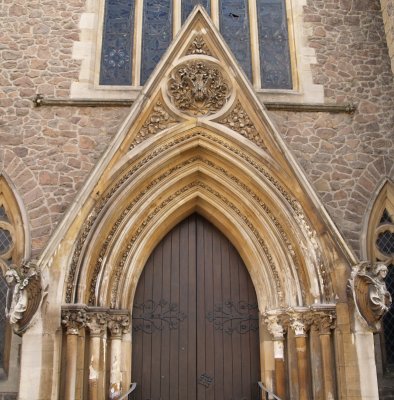 One of the ornately carved 'Gothic' doors of Seventh-Day Adventist Church on London Road.
